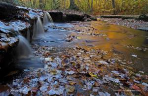 Behind the Autumn Photography Image of Stepstone Falls in Rhode Island 